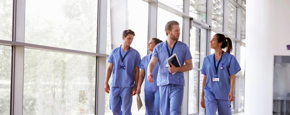 Doctors walking in a hospital corridor